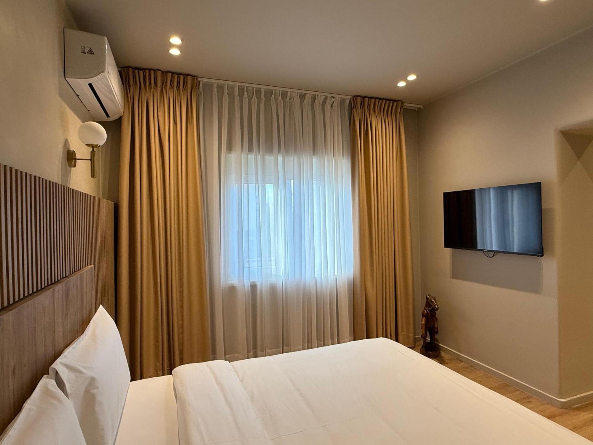 Vater Apartments Тирана Экстерьер фото